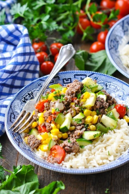 <p>The Seasoned Mom</p><p>Loaded with fresh seasonal produce, this easy ground beef dinner with summer vegetables is a simple and healthy dish that the whole family will love. Serve the meat and veggies with rice, pasta, or your favorite bread for a one-pot 30-minute meal!</p><p><strong>Get the recipe: <a href="https://www.theseasonedmom.com/ground-beef-dinner/" rel="nofollow noopener" target="_blank" data-ylk="slk:Ground Beef with Summer Vegetables;elm:context_link;itc:0;sec:content-canvas" class="link ">Ground Beef with Summer Vegetables</a></strong></p>