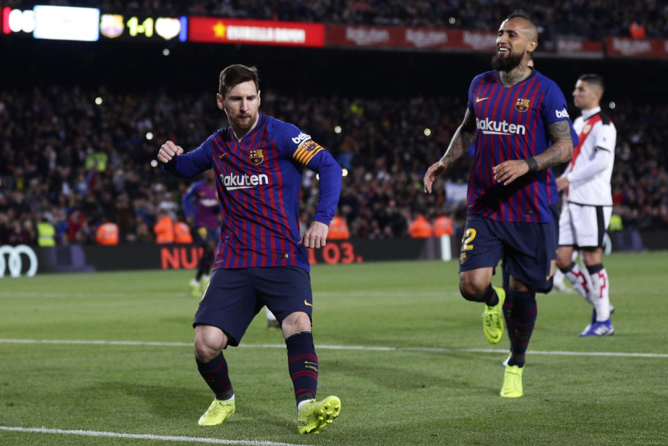 FC Barcelona's Lionel Messi celebrates after scoring his side's second goal from a penalty spot during the Spanish La Liga soccer match between FC Barcelona and Rayo Vallecano at the Camp Nou stadium in Barcelona, Spain, Saturday, March 9, 2019. (AP Photo/Manu Fernandez)