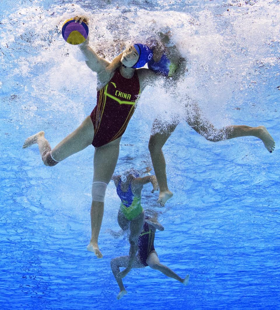 <p>Sun Yating of China is challenged during the Women’s Water Polo 7th – 8th Classification match between Brazil and China on Day 14 of the Rio 2016 Olympic Games at the Olympic Aquatics Stadium on August 19, 2016 in Rio de Janeiro, Brazil. (Photo by Adam Pretty/Getty Images) </p>