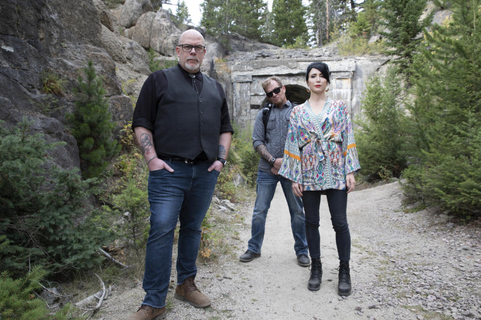 Hosts Dave Schrader (L), KD Stafford (C), Cindy Kaza (R) pose outside the tunnel at Thompson Park.