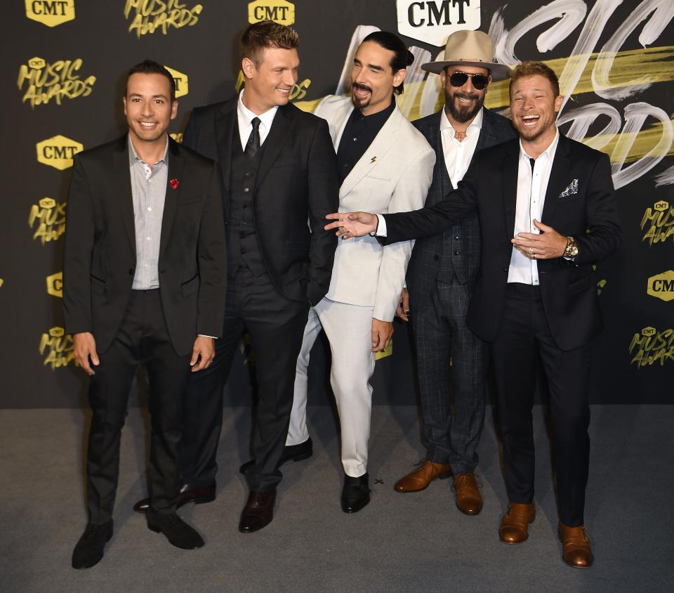 Backstreet Boys are on tour this summer. The group is shown in 2018 at the CMT Awards in Nashville.