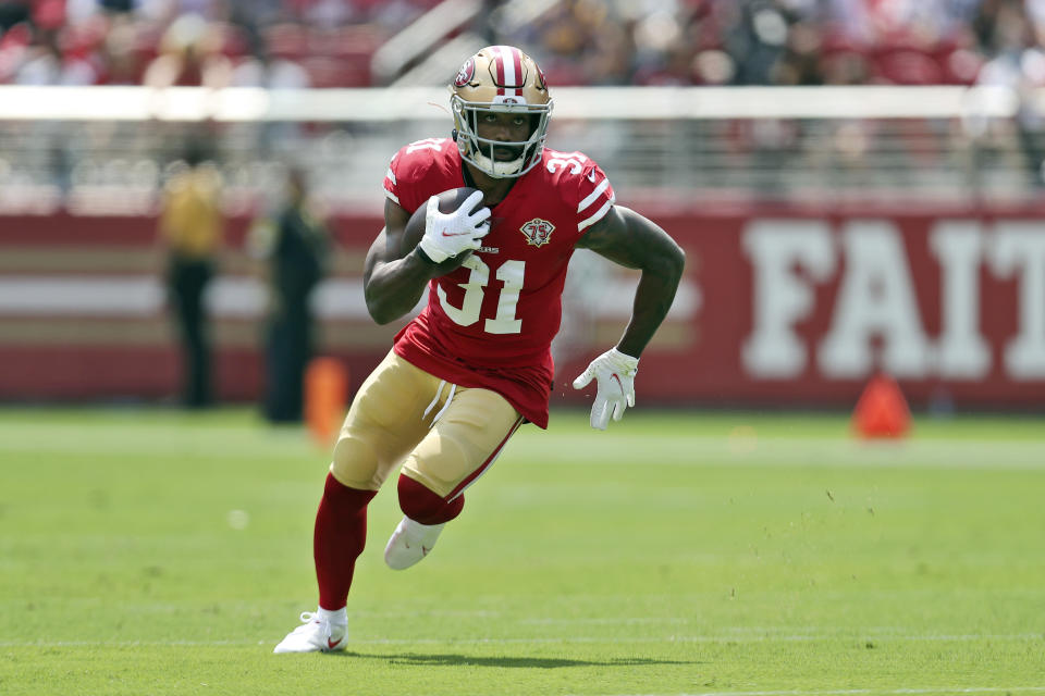 FILE- In this Sunday, Aug. 29, 2021, file photo, San Francisco 49ers running back Raheem Mostert (31) runs against the Las Vegas Raiders during a preseason NFL football game in Santa Clara, Calif. Mostert will undergo season-ending surgery on his knee after getting injured in the season opener, Sunday, Sept. 12, 2021. (AP Photo/Jed Jacobsohn, File)