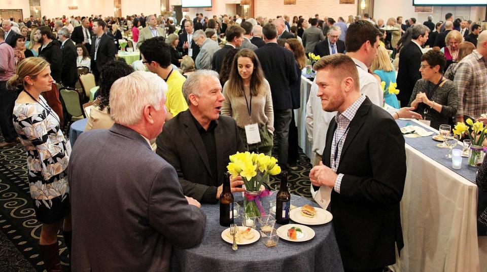 Guests at Taste of the South Shore sample food and drinks at Lombardo's in 2018. Ledger file photo