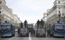 Riot police block a street to protect against Belarusian opposition supporters rally in Minsk, Belarus, Sunday, Sept. 6, 2020. Sunday's demonstration marked the beginning of the fifth week of daily protests calling for Belarusian President Alexander Lukashenko's resignation in the wake of allegedly manipulated elections. (AP Photo/TUT.by)