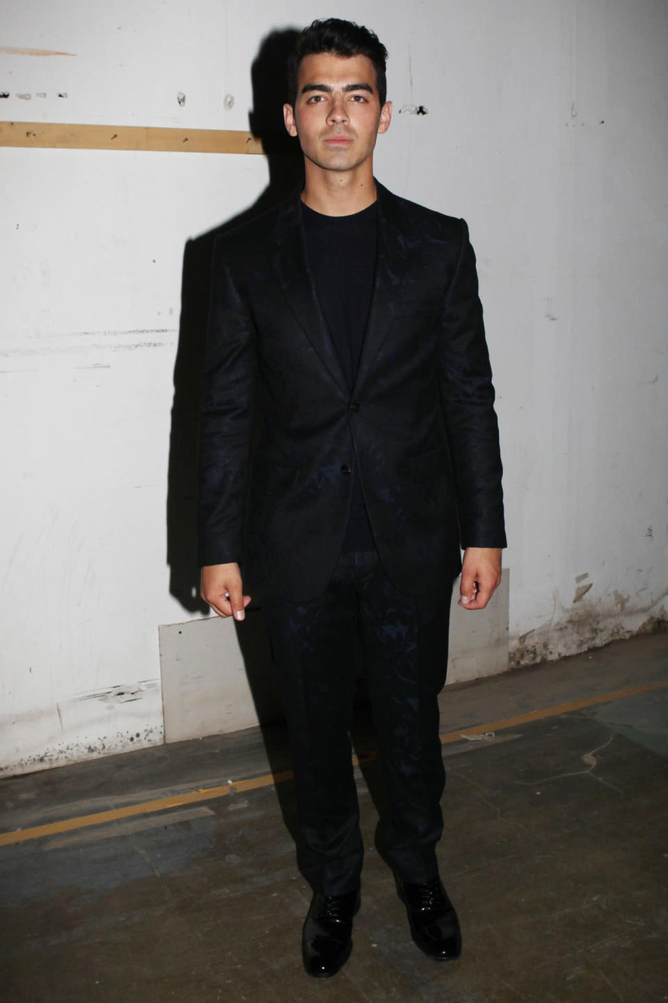 Joe Jonas backstage at Versace’s spring 2016 runway show in Milan.