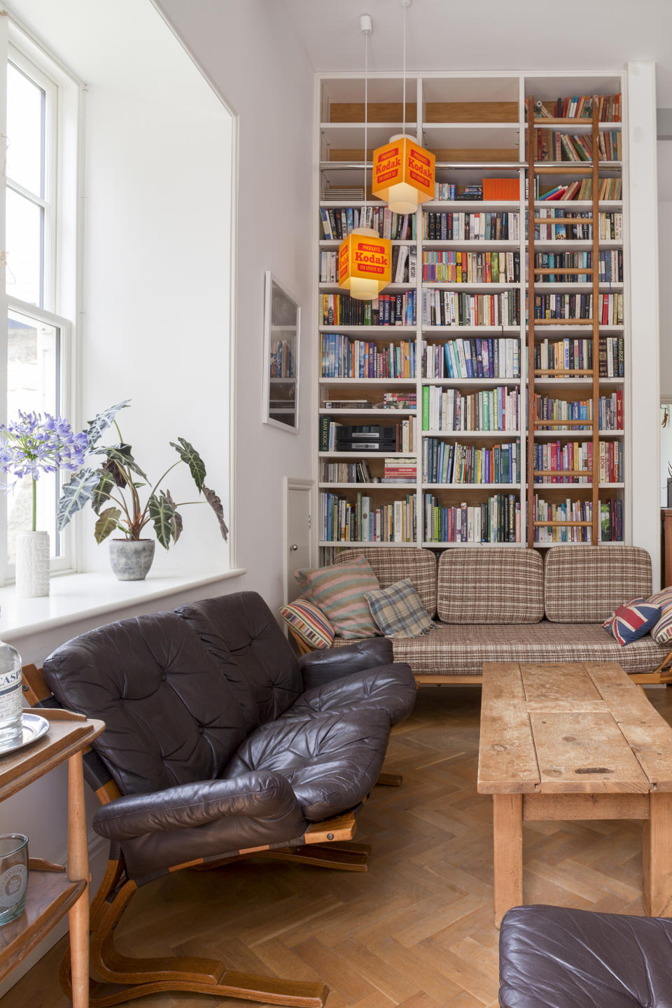 18. Cover a living room wall with shelving