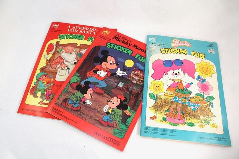 A Santa Claus, Mickey Mouse, and Poochie Sticker Fun book from the 1980s
