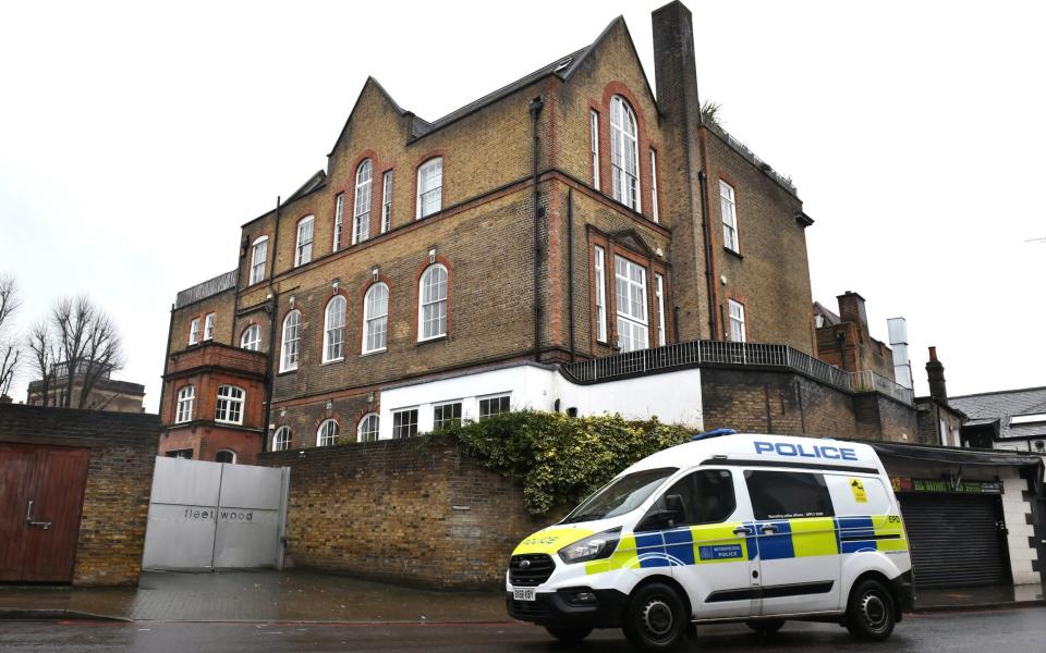 A police van parked outside Caroline Flack's home in Clapton, London