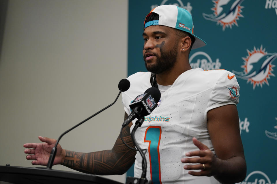 Miami Dolphins quarterback Tua Tagovailoa (1) speaks during a post game news conference following an NFL football game against the Carolina Panthers, Sunday, Oct. 15, 2023, in Miami Gardens, Fla. The Dolphins defeated the Panthers 42- 21. (AP Photo/Wilfredo Lee )