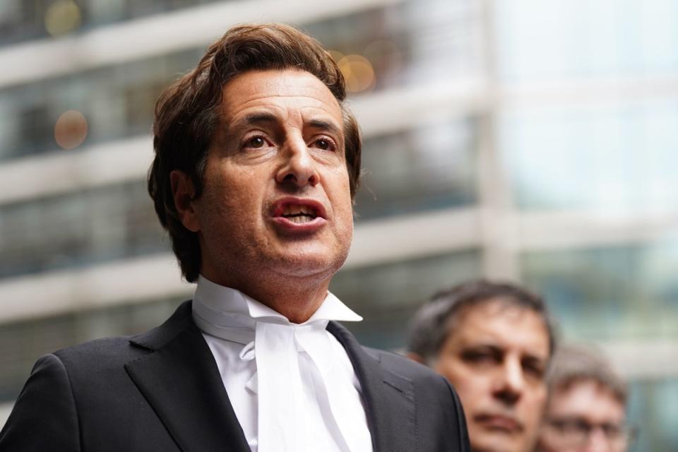 David Sherborne speaking to the media outside of the Rolls Building in central London on Friday (PA)