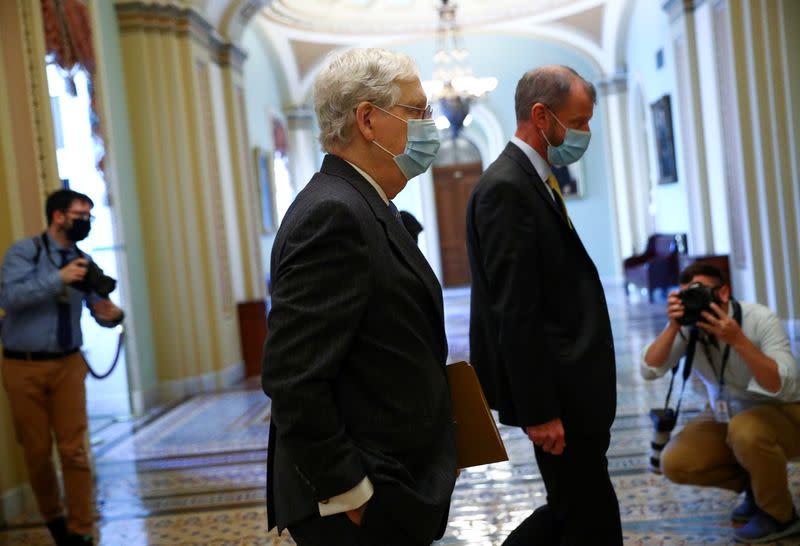 U.S. Senate Majority Leader Mitch McConnell walks through the U.S. Capitol in Washington