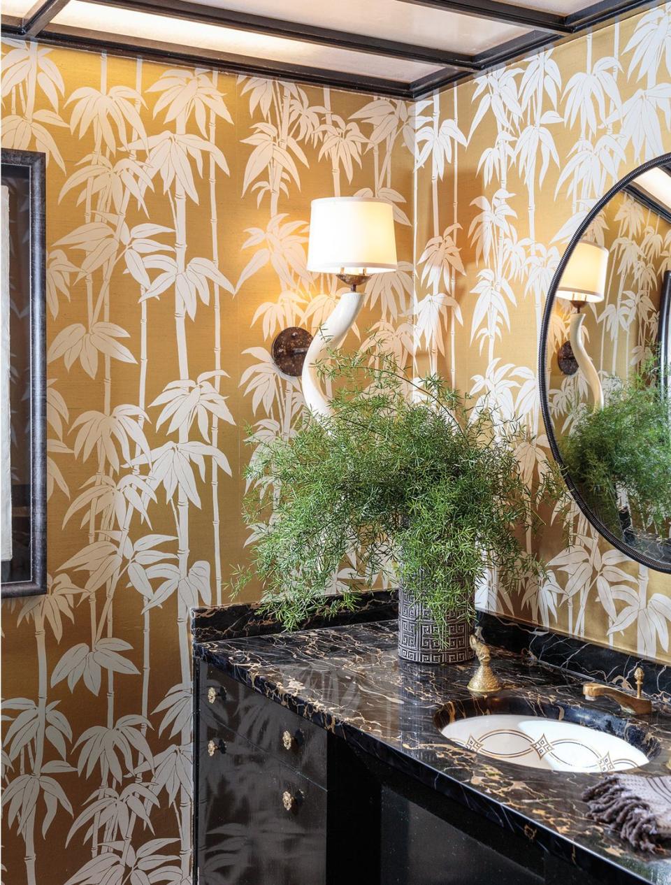 powder room with gold wallpaper