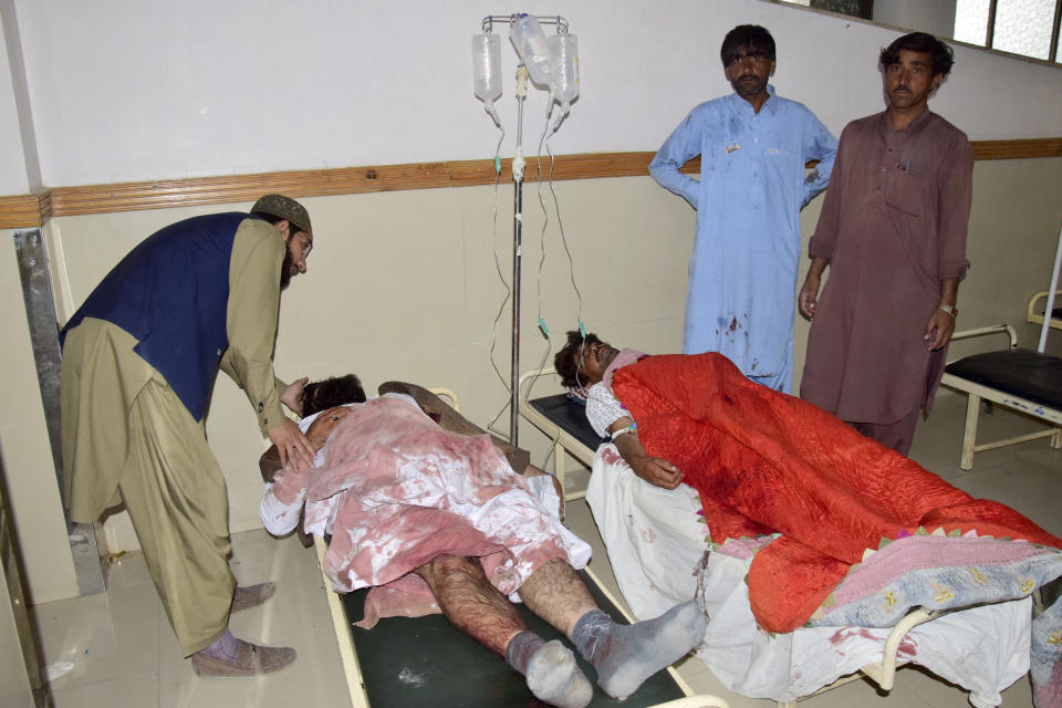 Injured victims of a bomb explosion are treated at a hospital, in Quetta, Pakistan, Friday, Sept. 29, 2023. A powerful bomb exploded at a rally celebrating the birthday of Islam's Prophet Muhammad in southwest Pakistan on Friday, killing multiple people and wounding dozens of others, police and a government official said. (AP Photo/Arshad Butt)