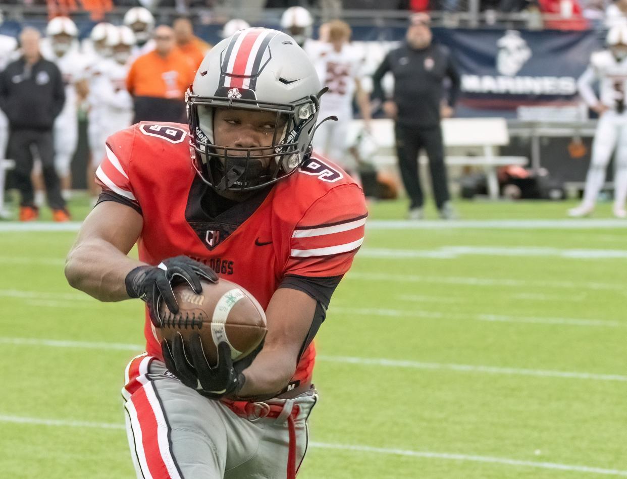 McKinley’s Dante McClellan grabs a pass during against Massillon on Saturday, Oct. 21, 2023.