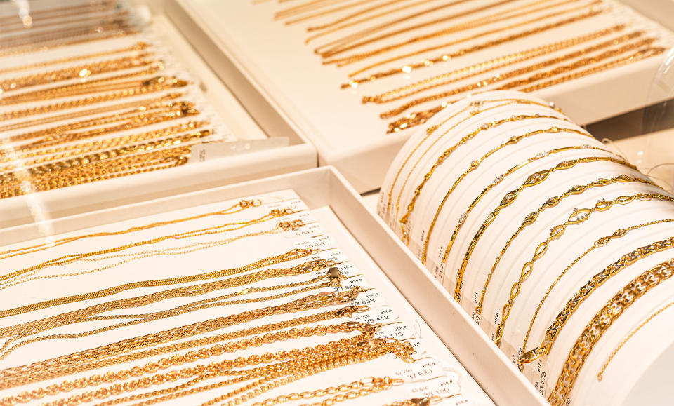 A display of an assortment of gold jewelry