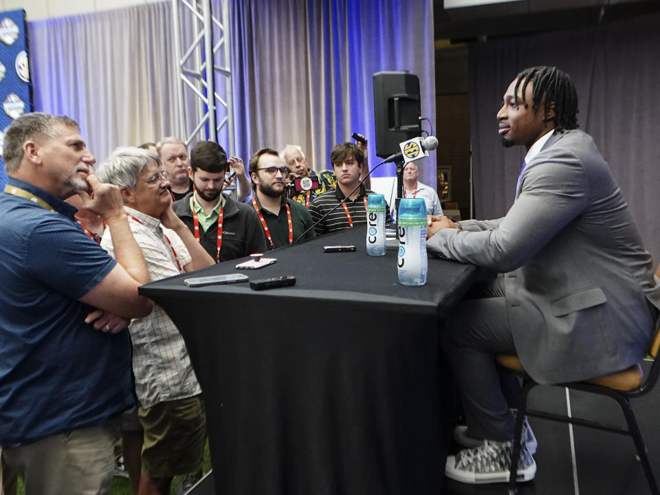 LSU defensive end B.J. Ojulari speaks to reporters during NCAA college football Southeastern Conference Media Days, Monday, July 18, 2022, in Atlanta. (AP Photo/John Bazemore)