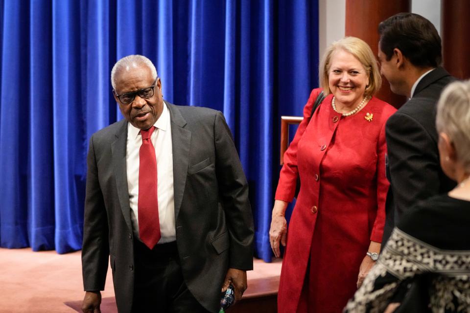 WASHINGTON, DC - OCTOBER 21: (L-R) Associate Supreme Court Justice Clarence Thomas and his wife and conservative activist Virginia Thomas arrive at the Heritage Foundation on October 21, 2021 in Washington, DC. Clarence Thomas has now served on the Supreme Court for 30 years. He was nominated by former President George H. W. Bush in 1991 and is the second African-American to serve on the high court, following Justice Thurgood Marshall. (Photo by Drew Angerer/Getty Images)