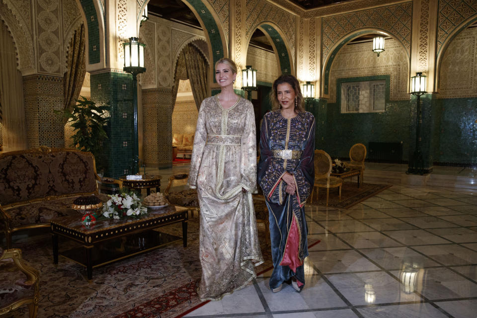 Wearing Moroccan caftans, Ivanka Trump, the daughter and senior adviser to President Donald Trump, left, stands with Princess Lalla Meryem of Morocco, Thursday, Nov. 7, 2019, before a dinner at the Royal Guest House in Rabat, Morocco. (AP Photo/Jacquelyn Martin)