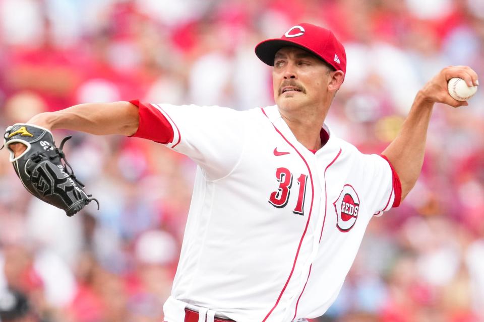 Cincinnati Reds starting pitcher Mike Minor (31) throws during the second inning of a baseball game against the St. Louis Cardinals, Saturday, July 23, 2022, in Cincinnati. (AP Photo/Jeff Dean)