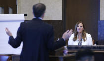 Jessica Hawkins, senior director of prevention services with the Oklahoma Department of Mental Health and Substance Abuse Services, testifies during the opioid trial Monday, June 24, 2019 in Norman, Okla. (AP Photo/Sue Ogrocki, Pool)