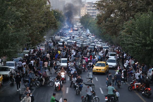 A picture obtained by AFP outside Iran on Sept. 21 shows Iranian demonstrators taking to the streets of the capital Tehran during a protest for Mahsa Amini, days after she died in police custody. (Photo: AFP via Getty Images)