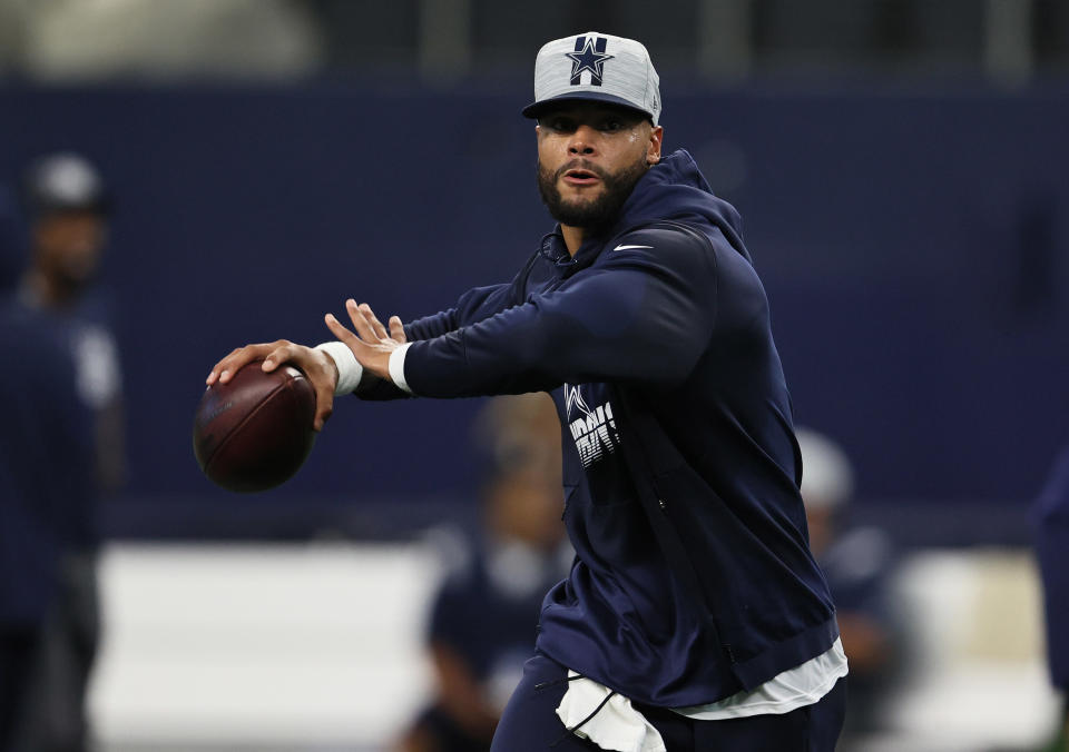 Aug 21, 2021; Arlington, Texas, USA; Dallas Cowboys quarterback Dak Prescott (4) throws prior to the game against the Houston Texans at AT&T Stadium. Mandatory Credit: Matthew Emmons-USA TODAY Sports