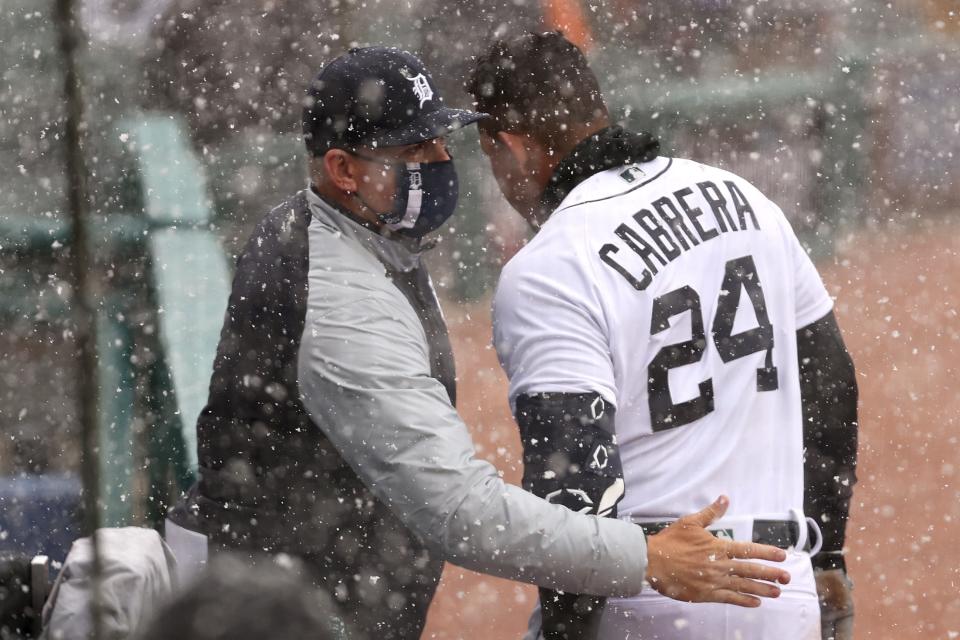 Miguel Cabrera (right) of the Detroit Tigers celebrates his first inning two run home run with manager A.J. Hinch.