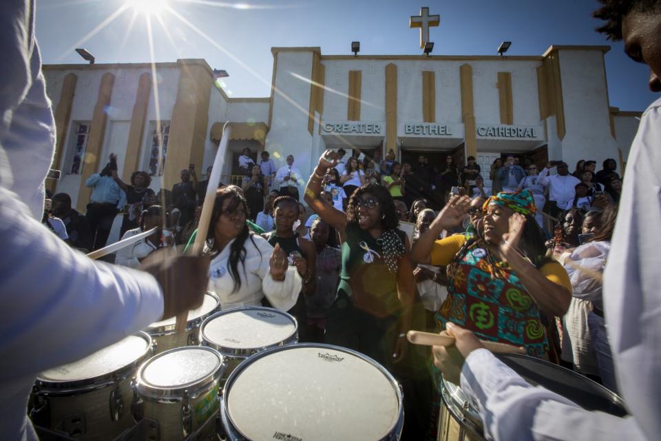 Drums and dancers outside a church