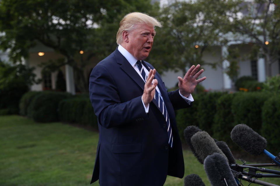 U.S. President Donald Trump talks to reporters as he departs for travel to Bedminster, New Jersey from the South Lawn of the White House in Washington, U.S., July 19, 2019. REUTERS/Leah Millis??