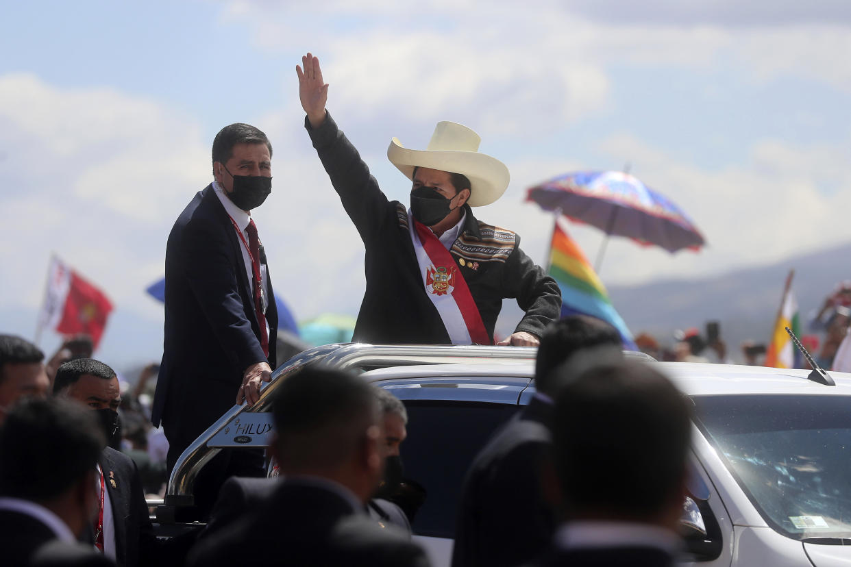 FILE - Peruvian President Pedro Castillo arrives to a symbolic swearing-in ceremony at the site of the 1824 Battle of Ayacucho, which sealed independence from Spain, at the Pampa de la Quinua as part of Peru's bicentennial celebrations in Ayacucho, Peru, July 29, 2021, the day after he was officially sworn in as president. On Dec 7, 2022, Castillo dissolved the nation's Congress and called for new legislative elections as lawmakers prepared to debate a third attempt to remove him from office. (AP Photo/Ernesto Arias, File)