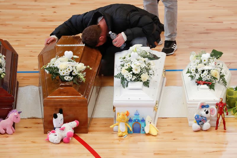 Mourners attend a lying-in-state for victims who died in a migrant shipwreck, in Crotone