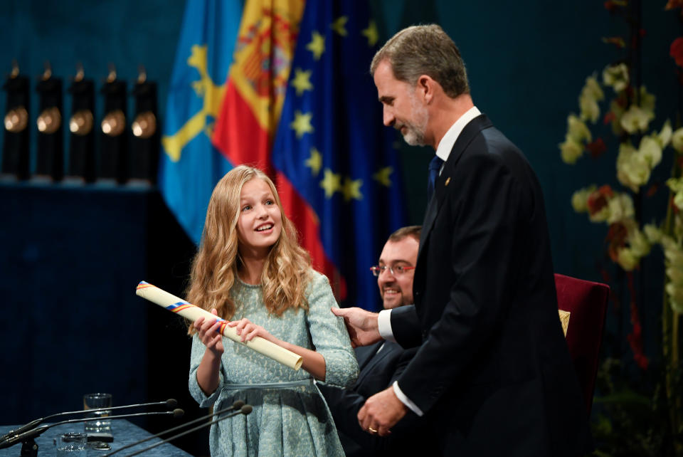 Spain's Princess Leonor looks at her father, Spain's King Felipe, as she delivers awards to the laureates during the Princess of Asturias Awards' ceremony at Campoamor Theatre in Oviedo, Spain October 18, 2019. REUTERS/Eloy Alonso