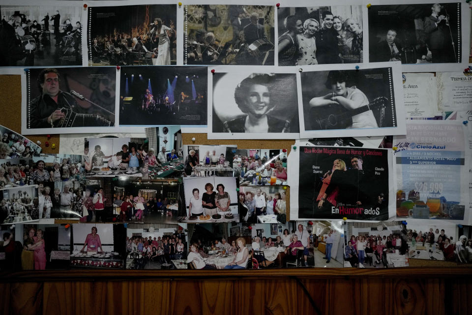 Pictures hang on the wall at the Caballito and Villa Crespo, a recreational day center for retirees, in Buenos Aires, Argentina, Wednesday, April 12, 2023. With inflation at 7.7% in March, keeping the year-on-year measurement above 100%, millions of retirees face the dilemma of whether to eat, take medication or pay the rent since their pensions do not cover a third of their bills. (AP Photo/Natacha Pisarenko)