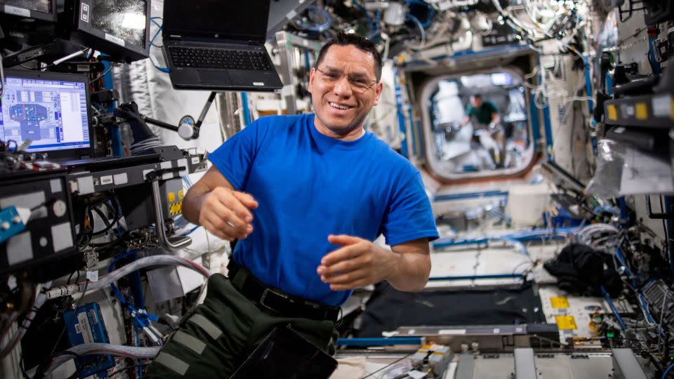 NASA astronaut Frank Rubio works inside the International Space Station's Destiny laboratory module in May 2023. - NASA