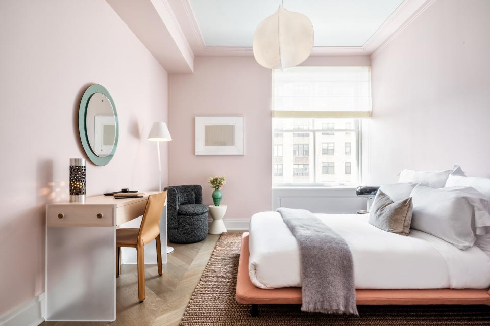 A second bedroom is the apartment's most colorful space. "My aim is always contemporaneity, but we are not modernists," de Cárdenas specifies. "I don't like all white walls. We like these soft pastels that aren't jarring but do kind of create more information on what exactly the space's purpose is."