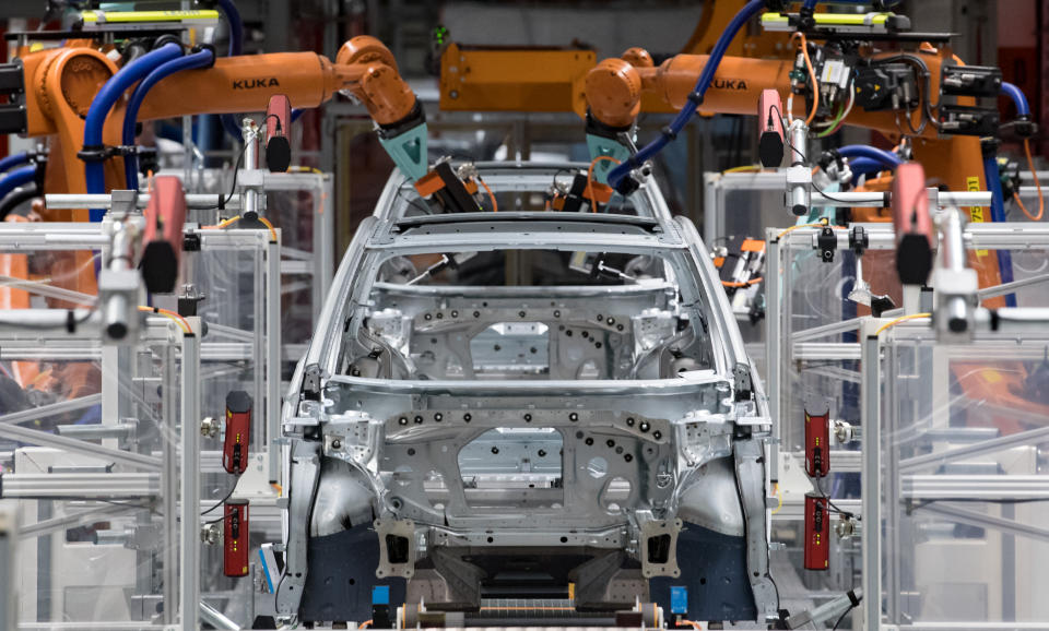 25 February 2020, Saxony, Zwickau: In the body shop of the Volkswagen plant in Saxony, robots assemble the doors of the VW ID.3. At the beginning of November 2019, Volkswagen initiated the system change to electromobility with the production start of the ID.3. The vehicle is the first model of the fully electric ID. family and is to establish the mass business with electric vehicles at the world's largest manufacturer. This year, VW plans to produce around 100,000 electric cars in Zwickau using the modular electric kit. From summer onwards, the vehicle is to be available for purchase throughout Europe. Around 8,000 people are currently employed at the Zwickau site. Photo: Hendrik Schmidt/dpa-Zentralbild/ZB (Photo by Hendrik Schmidt/picture alliance via Getty Images)