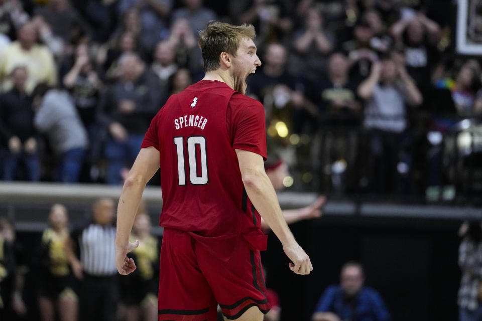 Rutgers guard Cam Spencer (10) celebrates after hitting the go ahead basket in the closing seconds during the second half of an NCAA college basketball game against Purdue in West Lafayette, Ind., Monday, Jan. 2, 2023. Rutgers defeated Purdue 65-64. (AP Photo/Michael Conroy)