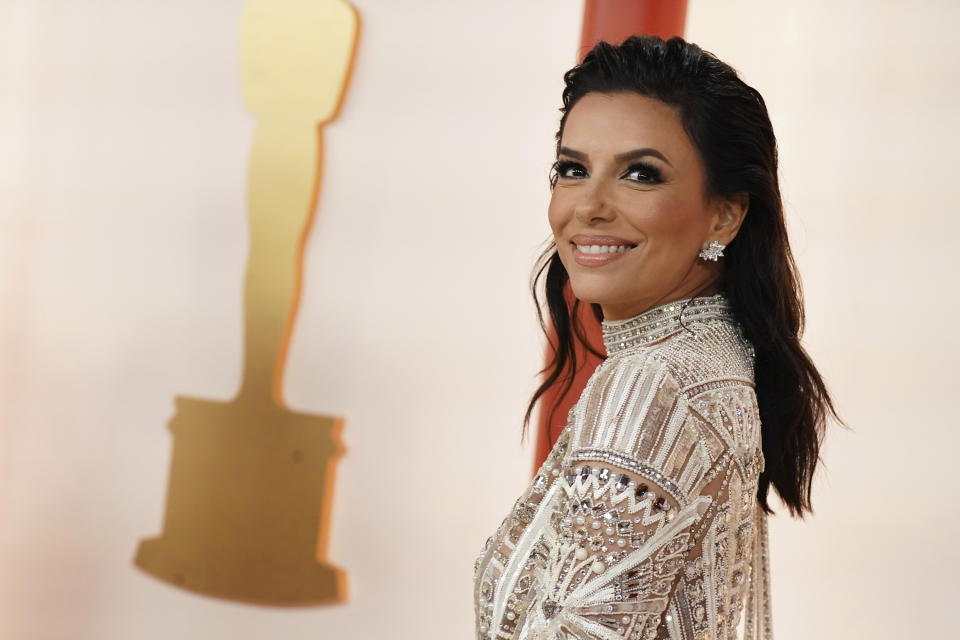 Eva Longoria arrives at the Oscars on Sunday, March 12, 2023, at the Dolby Theatre in Los Angeles. (Photo by Jordan Strauss/Invision/AP)