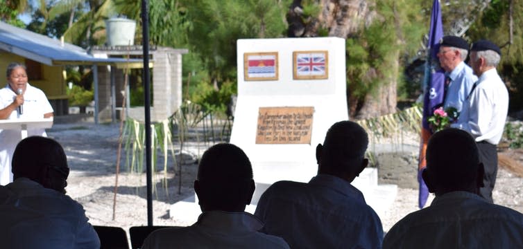 <span class="caption">The British nuclear test veterans undertake their memorial ceremony in Kiritimati, in 2018.</span>