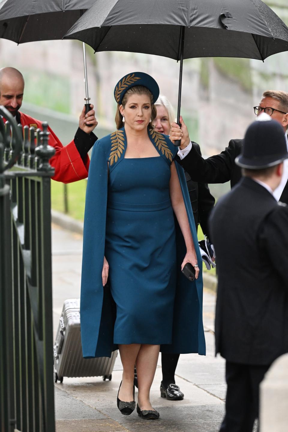 Mordaunt dazzled in a leaf-printed deep teal dress and cape (Getty Images)