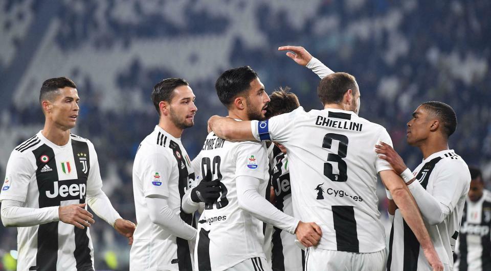 Juventus' Emre Can, third from left, celebrates with teammates, from left, Cristiano Ronaldo, Mattia De Sciglio, Giorgio Chiellini and Douglas Costa after scoring his side's second goal during the Serie A soccer match between Juventus and Chievo Verona at the Allianz Stadium in Turin, Italy, Monday, Jan. 21, 2019. (Alessandro Di Marco/ANSA via AP)