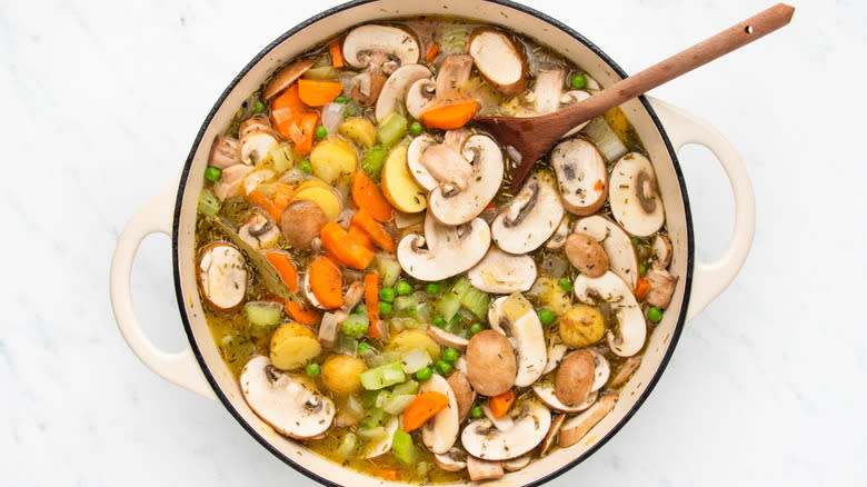 mushroom potato carrot vegetable casserole in pot