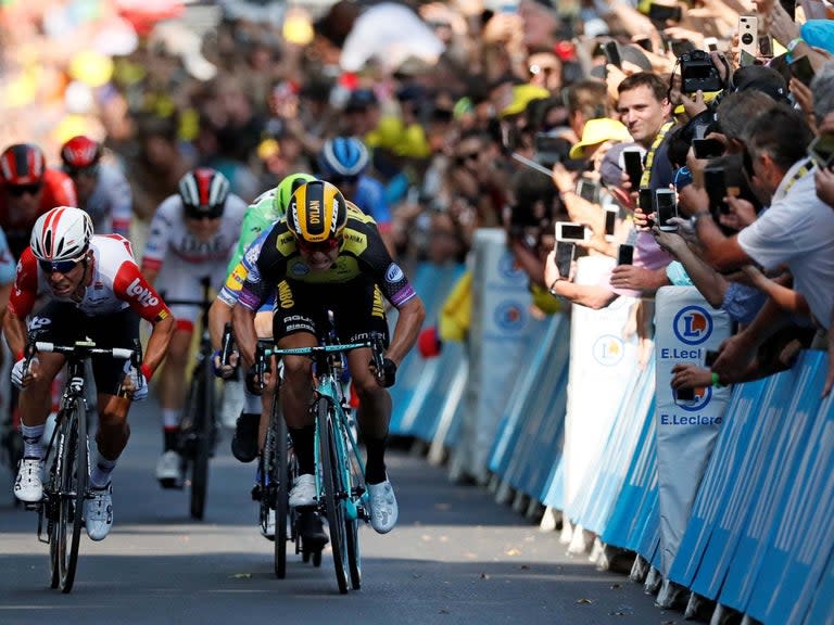 Spectators at the Tour de France have been urged to stay clear of the riders after one fan had a mobile phone knocked out of her hand while competitors sprinted towards the finish line on stage 11.Television footage caught the moment a female spectator leaning over the barrier saw the phone clatter to the ground off the helmet of Niccolo Bonifazio, the Italian sprinter for Team Direct Energie.Bonifazio seemed unfazed by the incident and was able to continue riding to the complete the stage, which was won by Australia’s Caleb Ewan.Cycling journalist Mikkel Conde tweeted the clip, along with the warning: “Please, spectators, stay out of the way. That goes for your phones as well! You risk crashing the riders and you’ll most definitely lose your phone in the process. Enjoy the show instead. It’s pretty spectacular already!”The Tour de France has a long history of interference by spectators. Four-time winner Chirs Froome has been on the receiving end of several incidents including having urine thrown at him, being spat on and being pushed off his bike.> Please, spectators, stay out of the way. That goes for your phones as well! You risk crashing the riders and you’ll most definitely lose your phone in the process. Enjoy the show instead. It’s pretty spectacular already! cc @Bonifazio_993 TDF2019pic.twitter.com/i2uyIxoylU> > — Mikkel Condé v2.0 (@mrconde) > > July 17, 2019Last year organisers increased the presence of railings on mountain passes in order to preserve some distance between fans and riders. However, there is a reluctance to inhibit the intimacy which makes road cycling unique compared to many other sports.