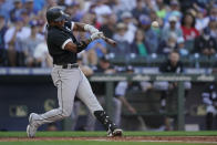 Chicago White Sox's Elvis Andrus hits a double during the fifth inning of a baseball game against the Seattle Mariners, Monday, Sept. 5, 2022, in Seattle. (AP Photo/Ted S. Warren)