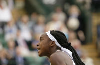 United States' Cori "Coco" Gauff shouts out as she plays United States's Venus Williams in a Women's singles match during day one of the Wimbledon Tennis Championships in London, Monday, July 1, 2019. (AP Photo/Tim Ireland)