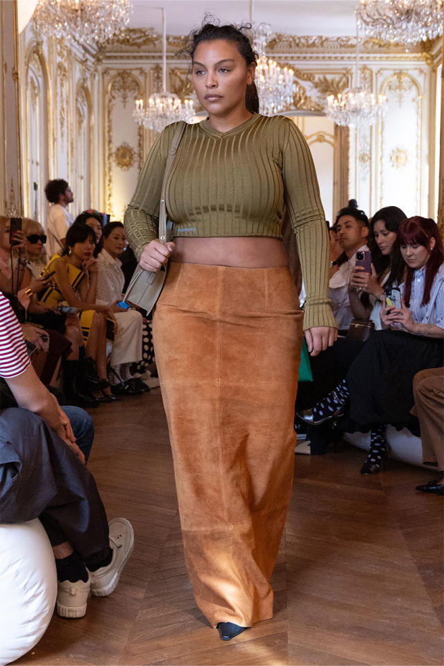 Woman with black leather Marni bag before Marni fashion show