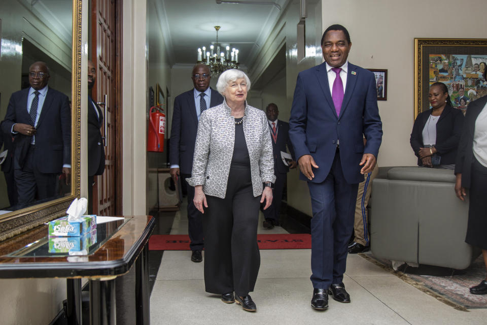 FILE - U.S. Treasury Secretary Janet Yellen, left, walks with Zambia's President Hakainde Hichilema during their meeting at the State House in Lusaka, Zambia, Jan. 23, 2023. Vice President Kamala Harris will be the latest and most high-profile administration official to visit Africa this year as the U.S. deepens its outreach to the continent. (AP Photo/Salim Dawood, File)