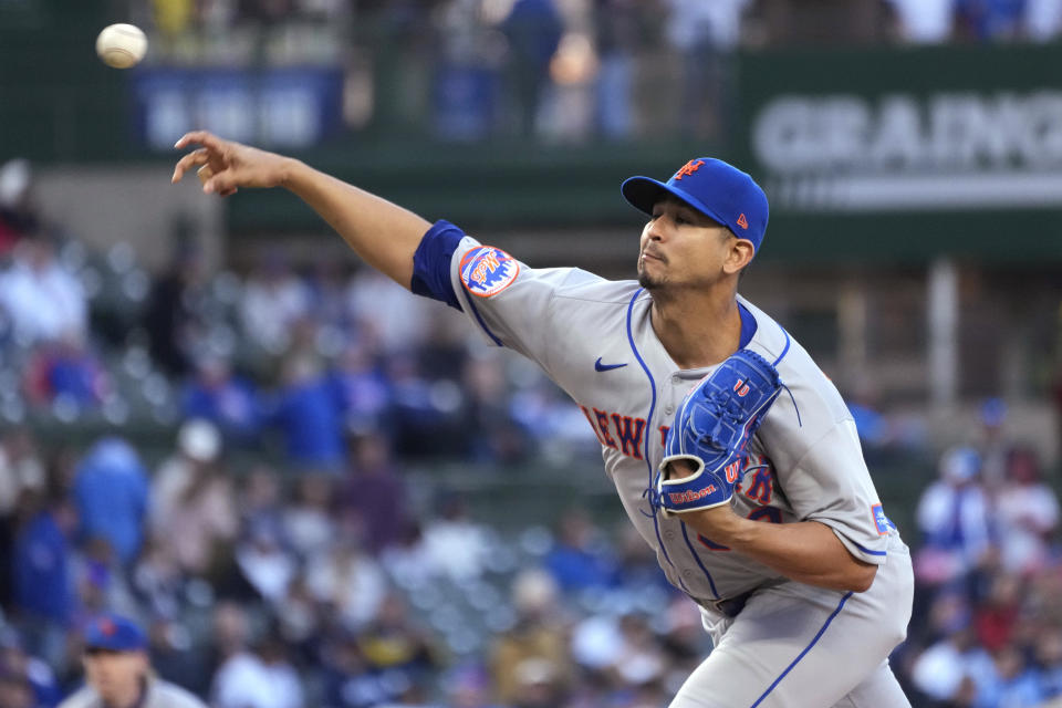 New York Mets starting pitcher Carlos Carrasco throws to a Chicago Cubs batter during the first inning of a baseball game in Chicago, Thursday, May 25, 2023. (AP Photo/Nam Y. Huh)