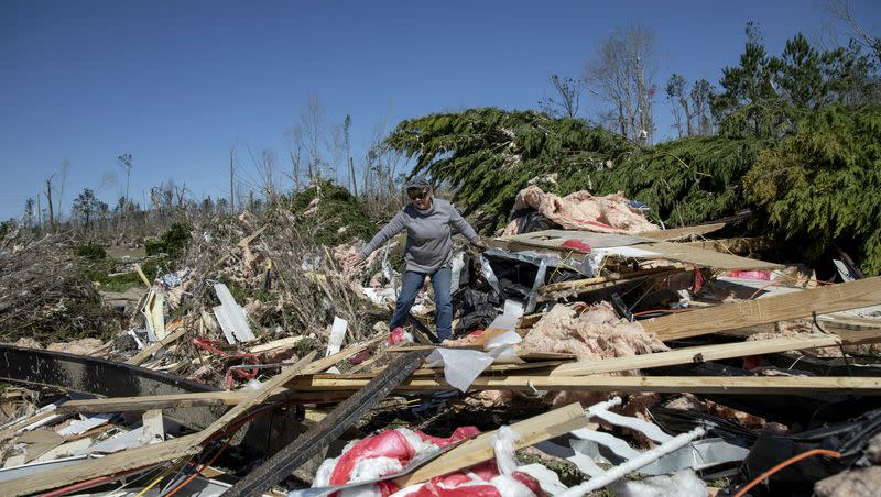 Cindy Sanford sifts through the debris while retrieving personal items after a tornado destroyed her home in Beauregard, Ala., Tuesday, March 5, 2019. A slew of extreme weather is predicted to hit the South this week. Here’s how to prepare for severe weather.