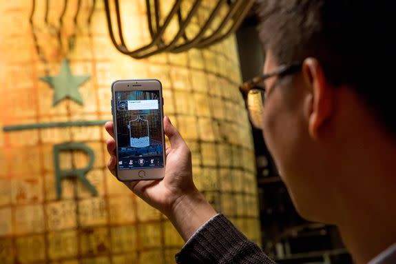 An augmented reality app is used in the new Starbucks Roastery in Shanghai, China. Photographed on Friday, December 1, 2017.  (Joshua Trujillo, Starbucks)